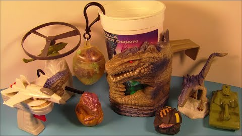 File:Taco Bell Godzilla toys.png