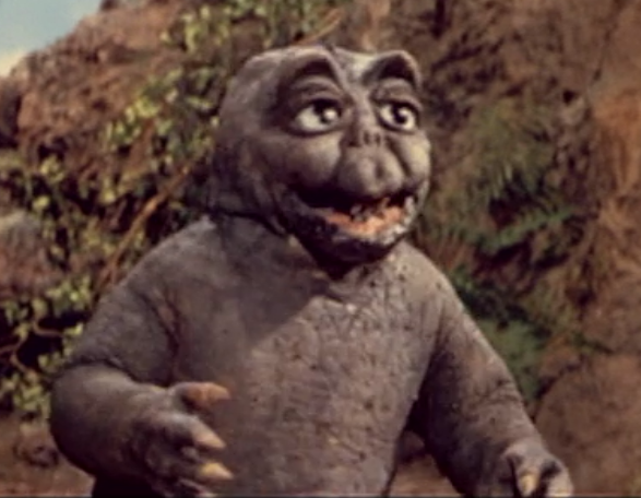 File:All Monsters Attack - Minilla stares intently.png