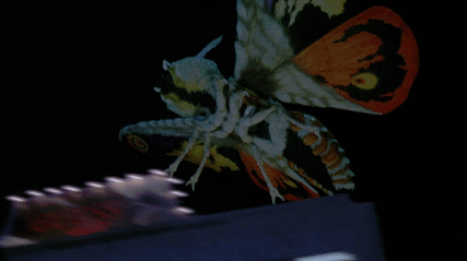 File:Mothra stings godzilla.gif