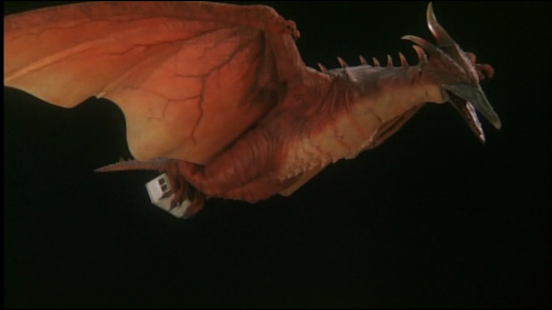File:Fire Rodan carrying the canister.png