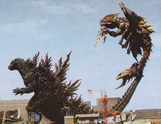 File:GXM - Godzilla uses tail in prehensile manner against Megaguirus.jpg
