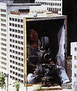 File:Cameraman in building.jpg