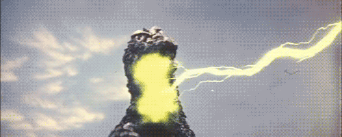 File:GTTHM - Godzilla gets blasted by gravity beams.gif