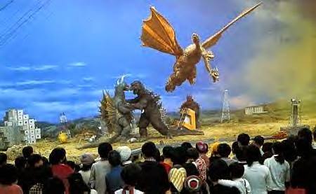 File:Godzilla vs Gigan with a lot of people watching.jpg