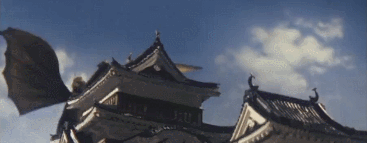 File:Showa King Ghidorah - Ghidorah destroys Japanese castles by flying over them (Hurricane Winds).gif