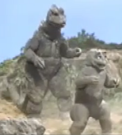 File:All Monsters Attack 7 - Godzilla forces Minilla to fight.png