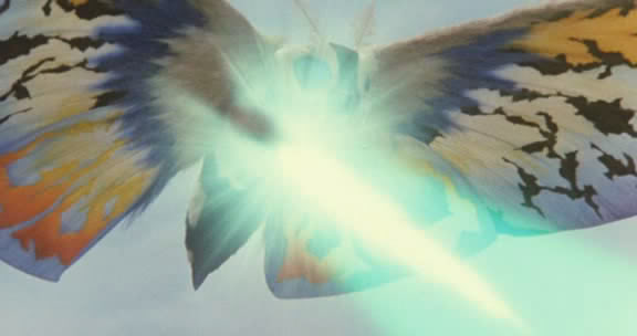 File:Rainbow Mothra firing his Multicolored Cross Heat Rainbow Laser Beams.jpg