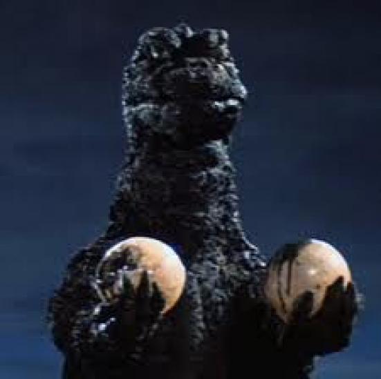 File:Godzilla holds Hedorahs eggs.jpg