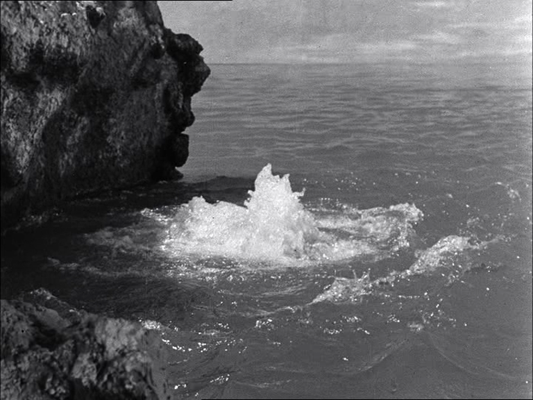 File:Godzilla Raids Again - 12 - The monsters fighting underwater, causing a spout of bubbling foam.png