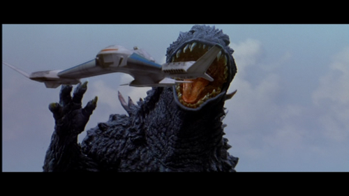 File:Godzilla tries to eat Griffon.png