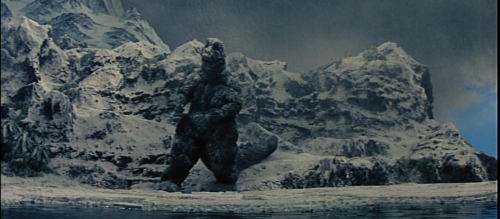 File:SOG - LOST SCENE where Godzilla turns back to Minilla.png